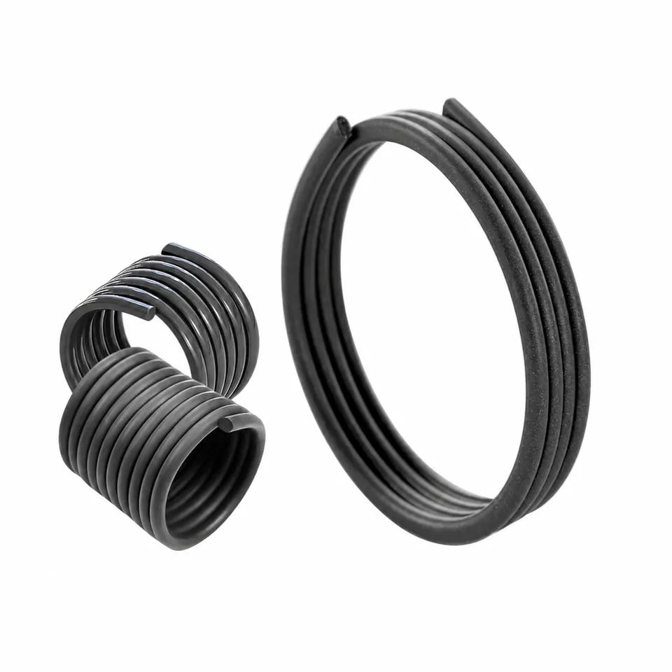 Three dark coiled magnetic closure profiles, including round and flattened constructions.